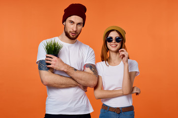Obraz premium cheerful young couple in t-shirts