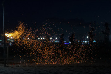 Floating of corns remaining at sky during night time near a beach