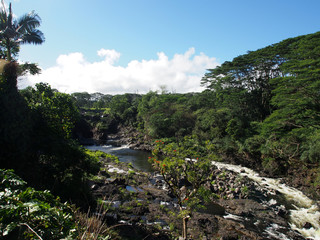 Fototapeta na wymiar Wailuku River runs towards Boiling Pots
