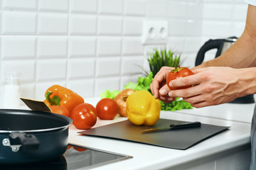 woman cutting vegetables in the kitchen