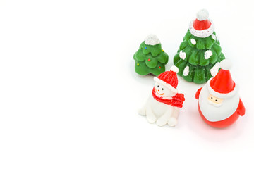 Group of Xmas dolls isolated on white background. This dolls is famous to decorate or create more Christmas atmosphere.