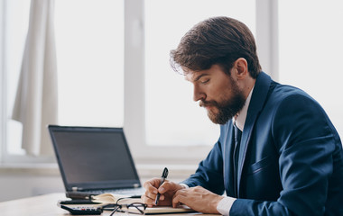 man working on his laptop