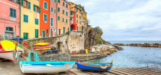 Fototapeta na wymiar Beautiful colorful cityscape on the mountains over Mediterranean sea Europe Cinque Terre