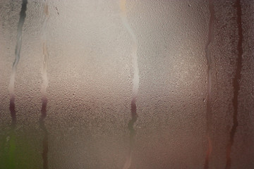 Fragment of the window after the rain as a texture or background.