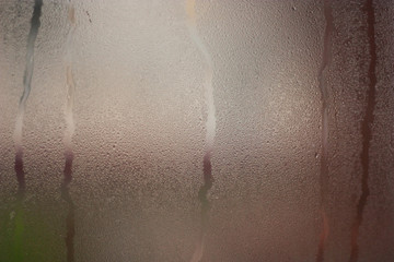 Fragment of the window after the rain as a texture or background.