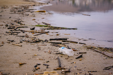 Plastic water bottle on the beach