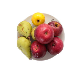 Fresh pears and apples on a light background