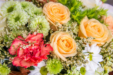 Bunch of colorful  flowers in basket