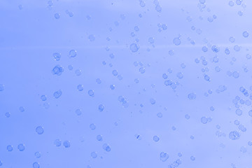 Fototapeta na wymiar soap bubbles on a blue background