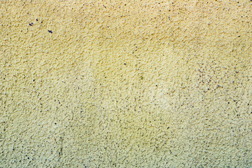 Texture of a concrete wall with cracks and scratches which can be used as a background