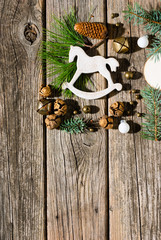 old style Christmas ornaments on weathered wooden table background