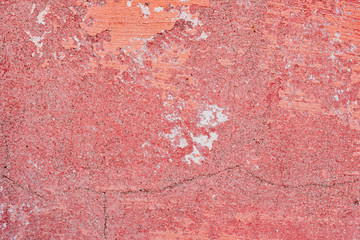 Fototapeta premium Texture of a concrete wall with cracks and scratches which can be used as a background
