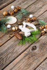 old style Christmas ornaments on weathered wooden table background