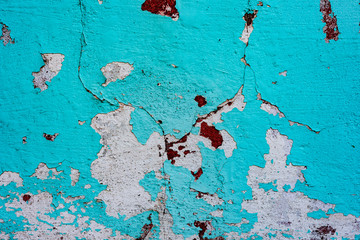 Texture of a concrete wall with cracks and scratches which can be used as a background