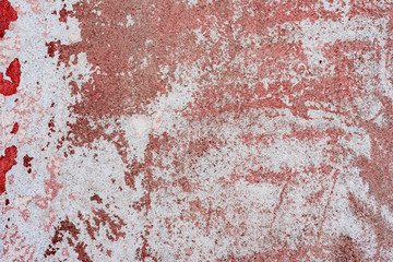 Texture of a concrete wall with cracks and scratches which can be used as a background