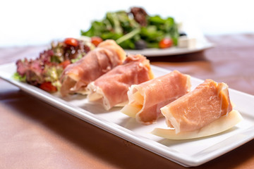 Parma ham served with cantaloupe