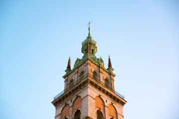 Fototapeta na wymiar church bell tower on sunset