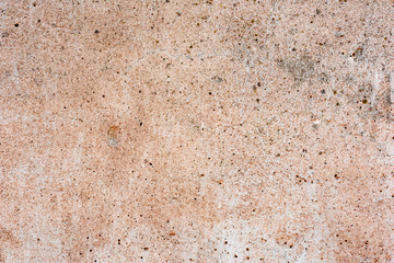 Texture of a concrete wall with cracks and scratches which can be used as a background