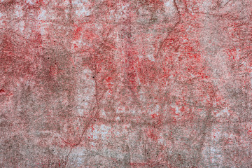 Texture of a concrete wall with cracks and scratches which can be used as a background