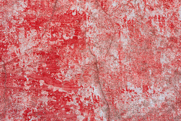 Texture of a concrete wall with cracks and scratches which can be used as a background