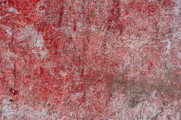 Texture of a concrete wall with cracks and scratches which can be used as a background