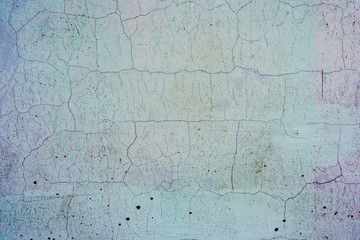 Texture of a concrete wall with cracks and scratches which can be used as a background
