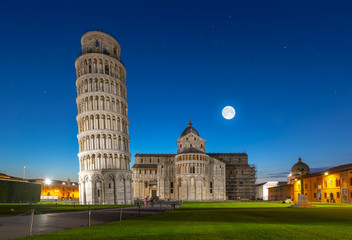 Night view of Pisa Cathedral with Leaning Tower of Pisa on Piazza dei Miracoli in Pisa, Tuscany, Italy. The Leaning Tower of Pisa is one of the main landmark of Italy