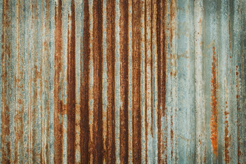 Old zinc wall texture background, rusty on galvanized metal panel sheeting.