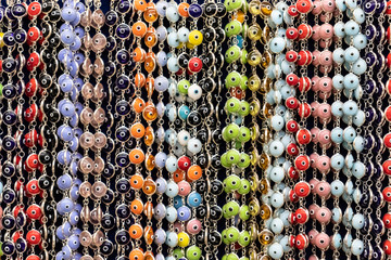 Multicolored evil eye supersticious bracelets background texture