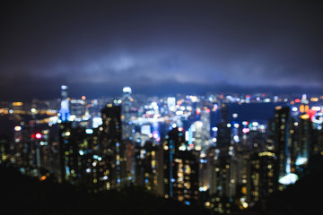 Obraz premium View of the night modern city - Out of focus. Bokeh lights.