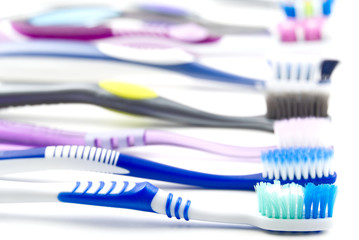 toothbrushes isolated on white close up photo