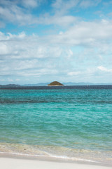 Philippines El nido , Palawan white sand beach without people, blue sky , turquoise water 