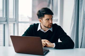 businessman working on laptop in office