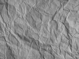 Brown crumpled paper texture as background. Top view. White crumpled paper as background texture textures