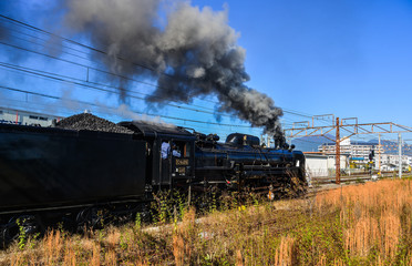 Fototapeta na wymiar C61 steam locomotive (Joyful Train)