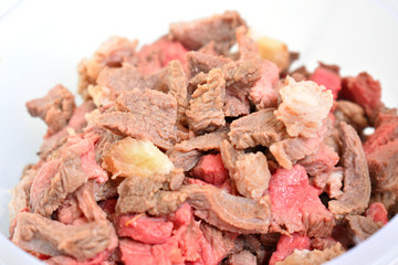 Boiled meat in white cup