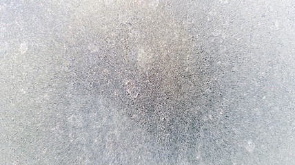 textured abstract background with frozen window, icy texture