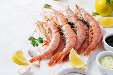 Raw wild Argentinian red shrimps/prawns  and ingredients for cooking. Delicious food. Keto / Paleo Diet.