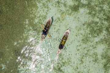 Aerial view of Sea Gypsy water village, island and the ocean with sky in Semporna, Sabah, Malaysia,...
