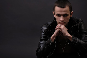 Obraz premium Young pensive man