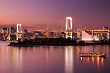 Fototapeta na wymiar Rainbow Bridge and Sumida River in Tokyo, Japan. Night photo.