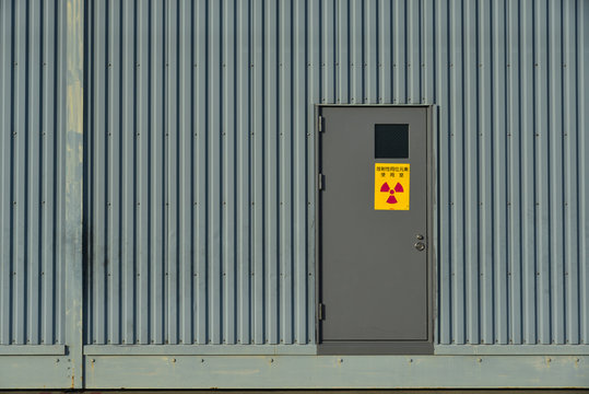 Steel door with red radiation symbol