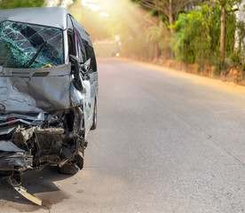 Front of  white color van car have damaged and broken by accident on road parking can not dirve any more. Save with clipping path.