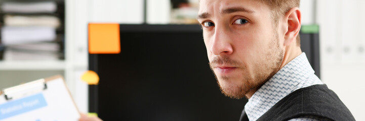 Obraz premium Young smile man at office workspace closeup