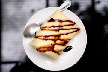 Dessert of banana cold crepe.