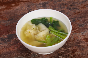 Asian traditional Wonton soup with herbs