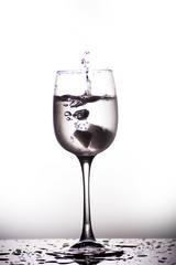 Glass with water isolated on a white background