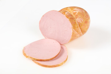 Tasty meat sausages over white background