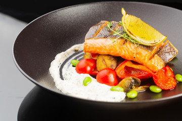 fried salmon steak with vegetables