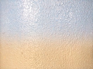 Blue and yellow cement on abstract background